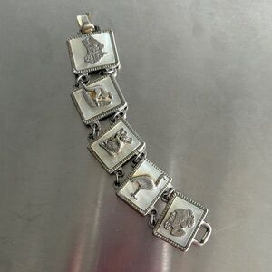 Coro des patent pending vintage Silver Animal Motif charm Bracelet